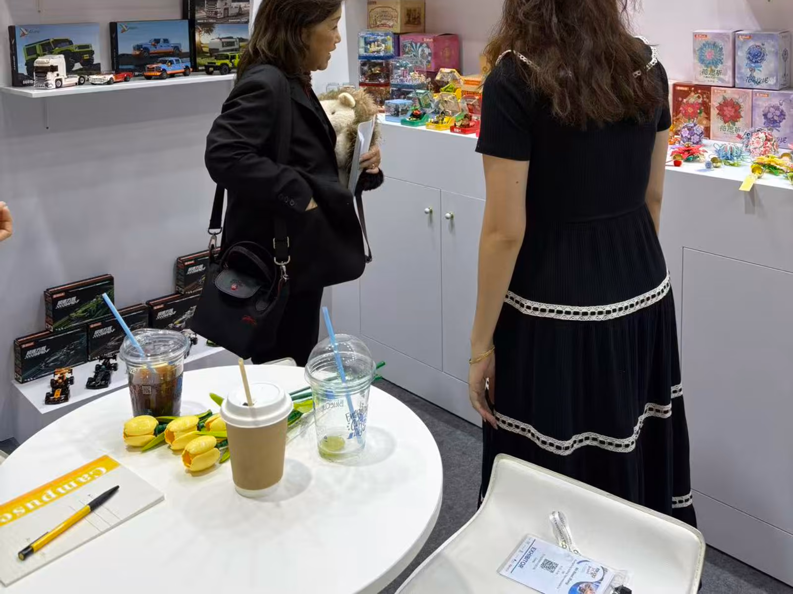 A visitor in conversation with the JIESTAR team at MEGA SHOW Bangkok 2026