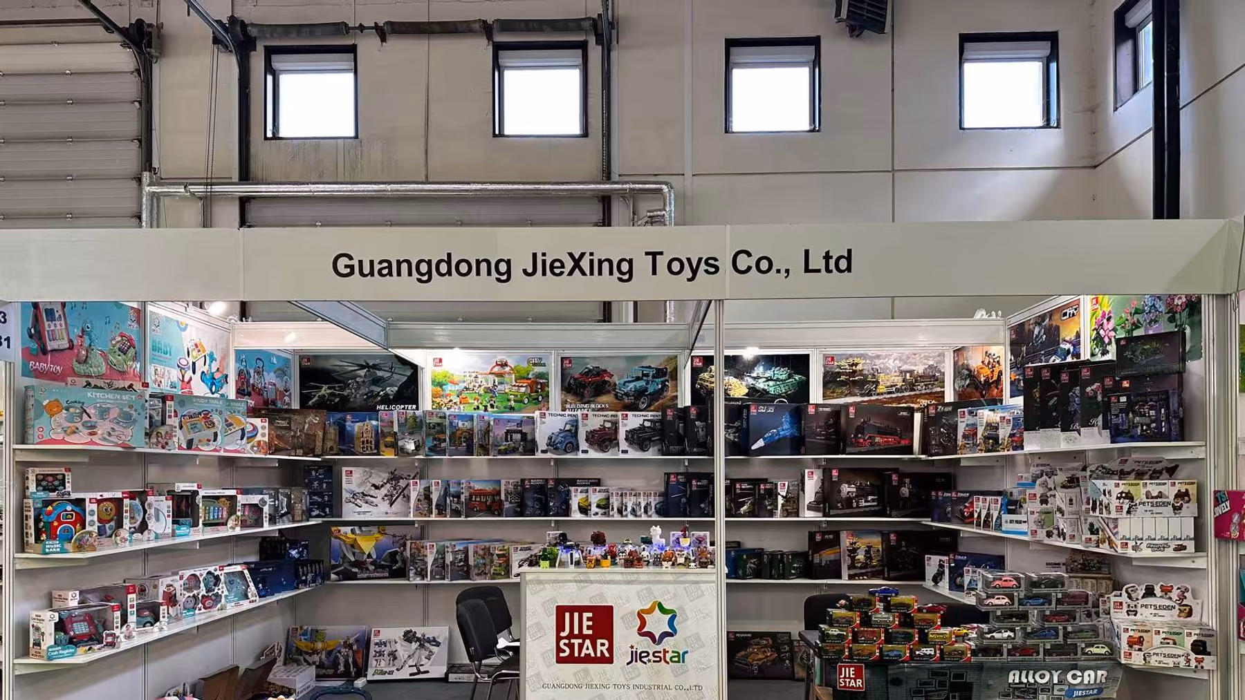 JIESTAR booth 23A81 filled with boxed building block sets at Mir Detstva 2023 in Moscow