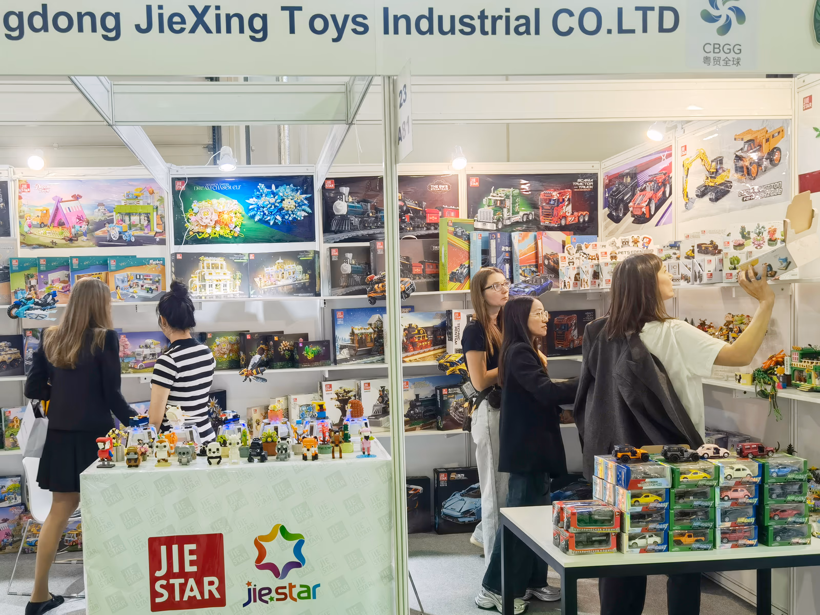 JIESTAR staff and visitors surrounded by building block products in Moscow
